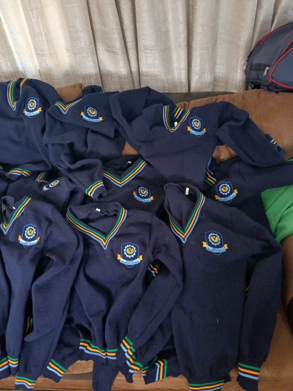 Navy school jerseys with embroidered crest — M2 Embroidery