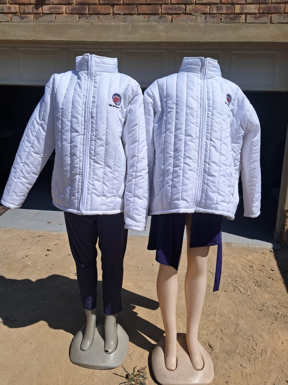 Custom branded puffer jackets — M2 Embroidery