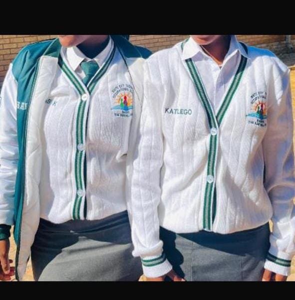 White school cardigans with green trim & name embroidery — M2 Embroidery